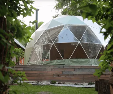 green geodesic dome in the garden