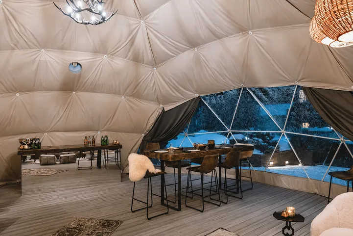 The center of the geodesic dome overlooking the table and window
