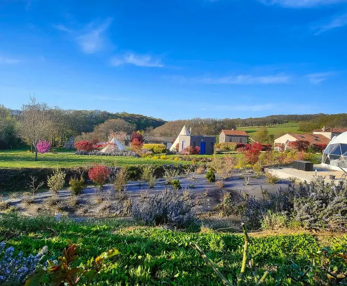 garden with some houses and a white geodesic dome