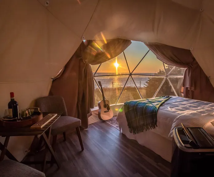 slow movement glamping dome in sunset FDomes