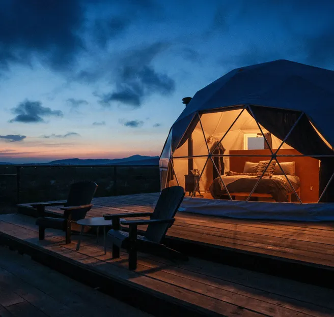 geodesic dome on wooden deck at night