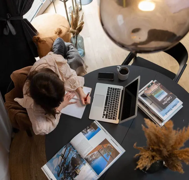 workcation woman sitting in the desk in geodesic dome powered by FDomes