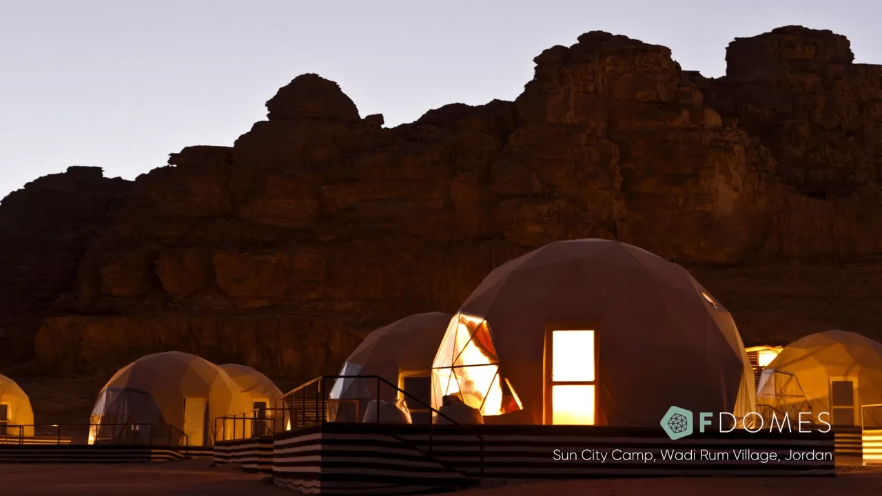 glamping domes desert sunset