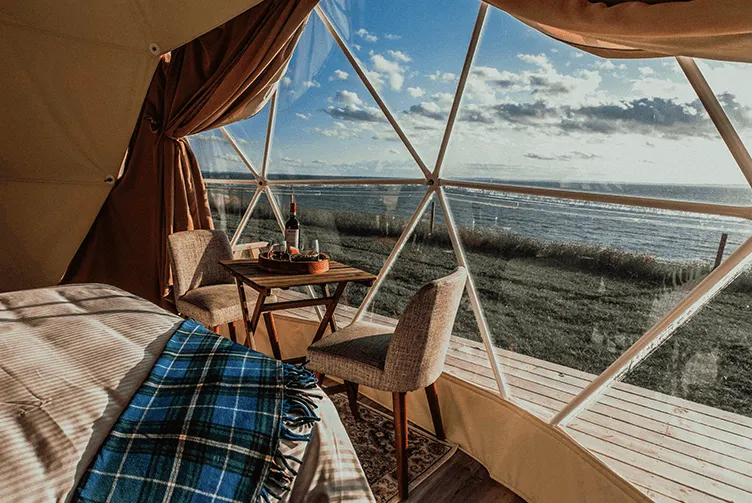 view from panoramic window in glamping geodesic dome