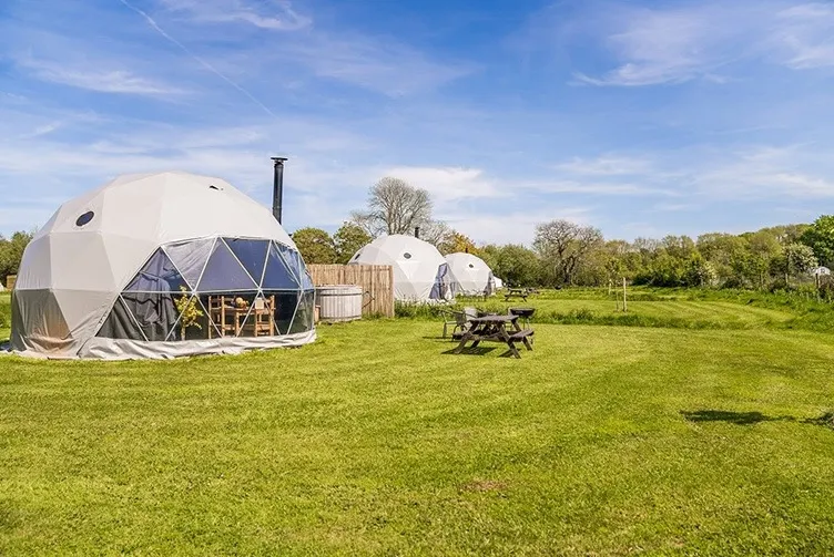 green geodesic domes with stack on filed