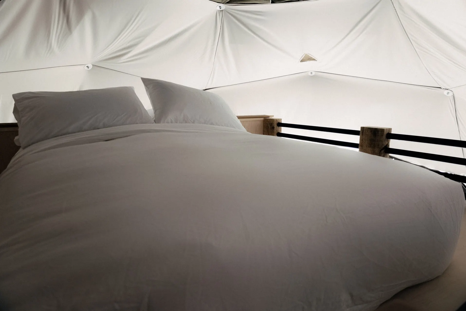 loft bed in geodesic dome on mezzanine