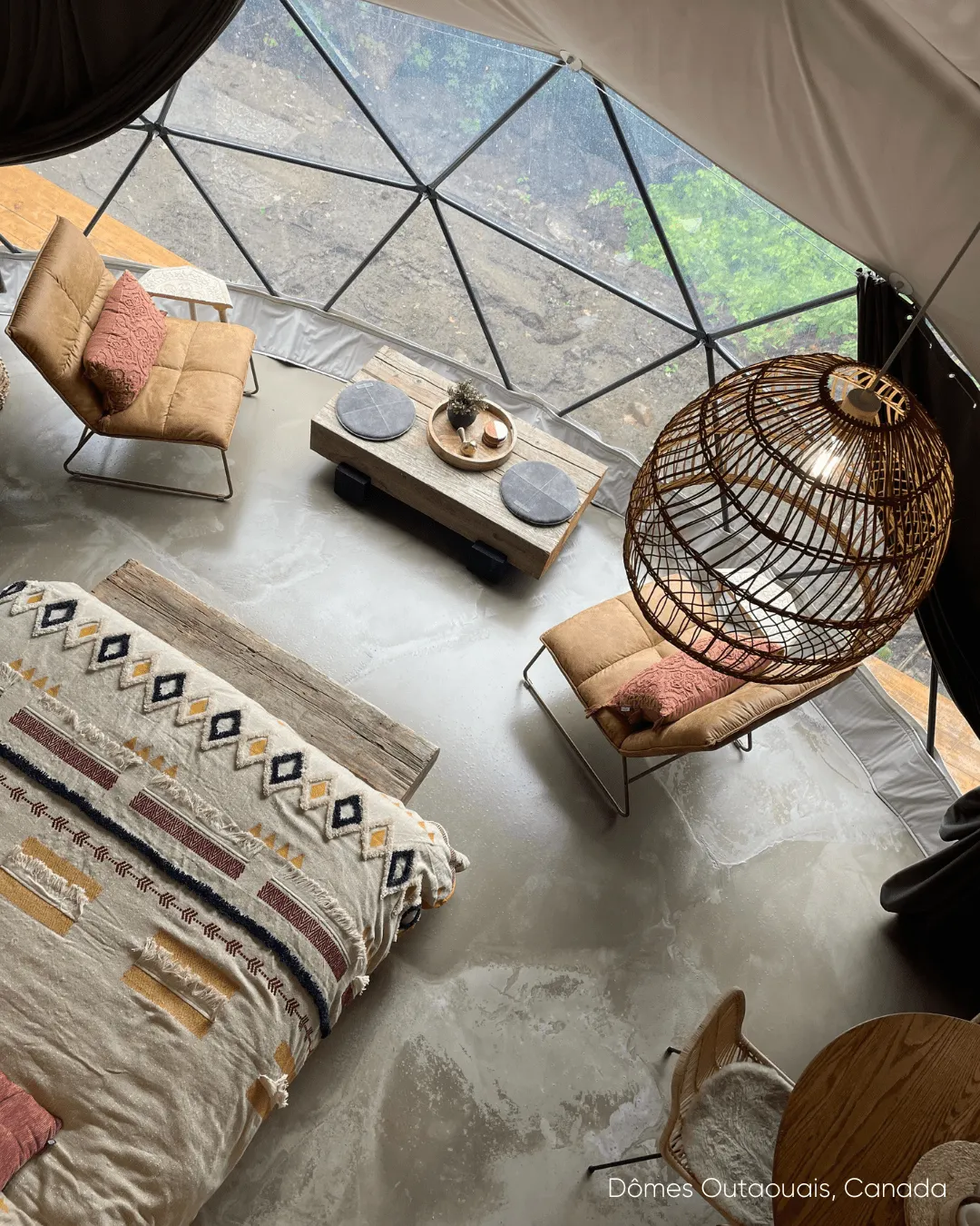 bed inside glamping dome luxury