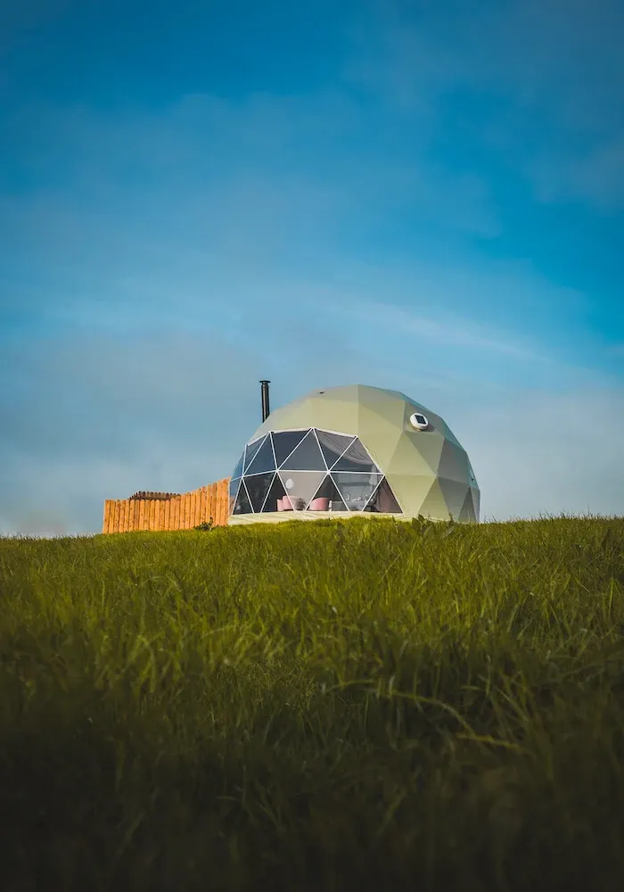 green geodesic dome on the field