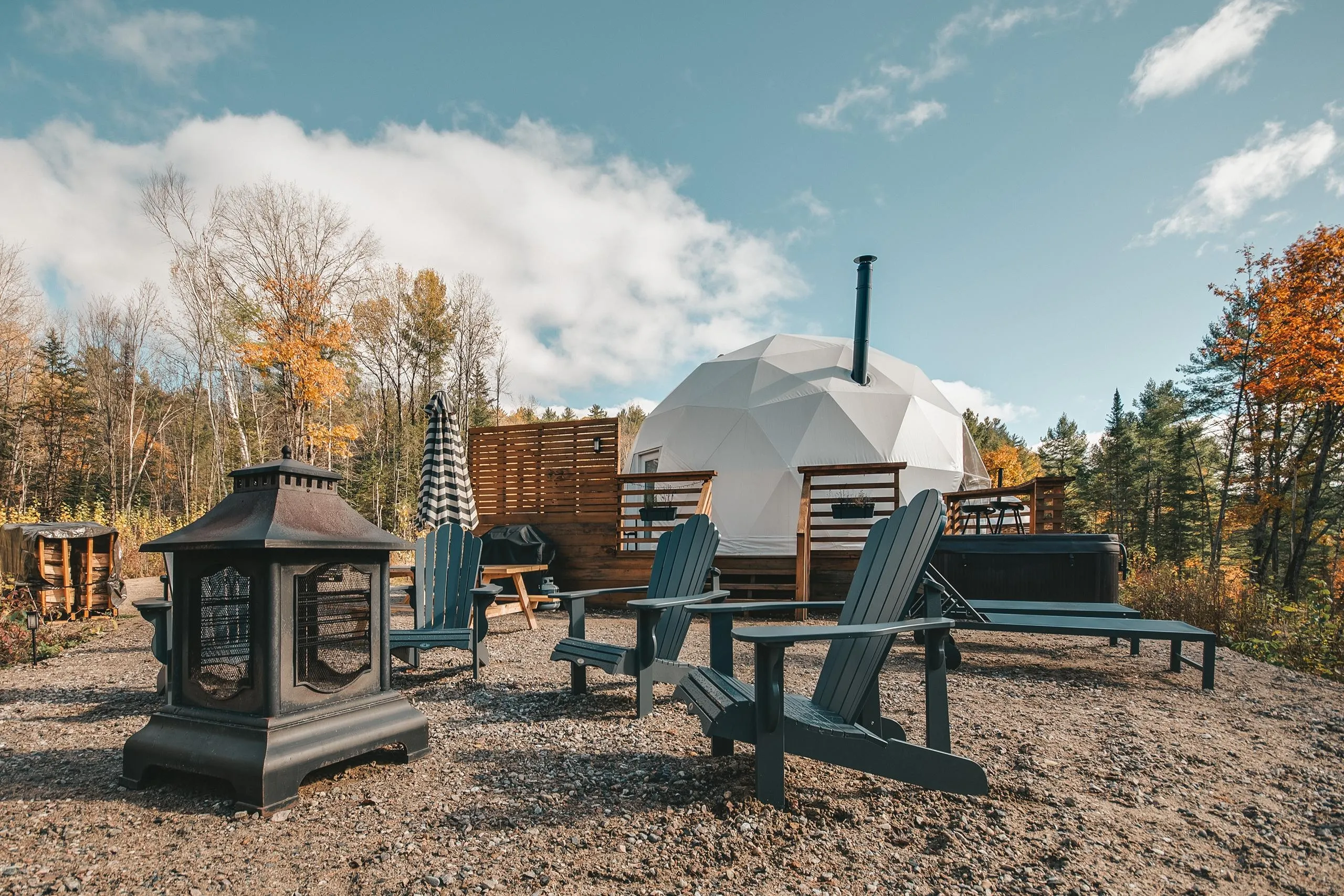 white geodesic dome with stack in autumn