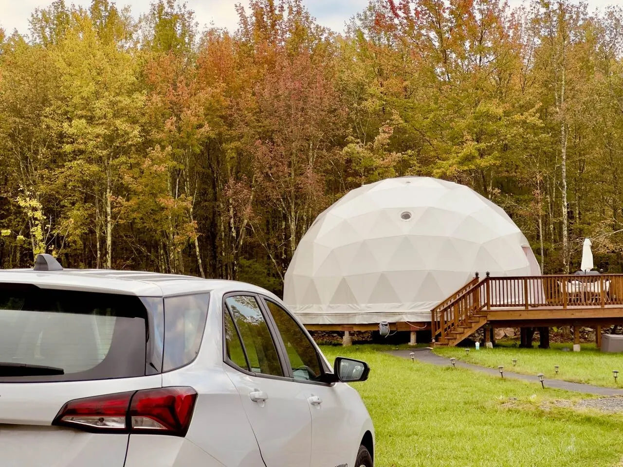 white dome woods and car Unique Escapes