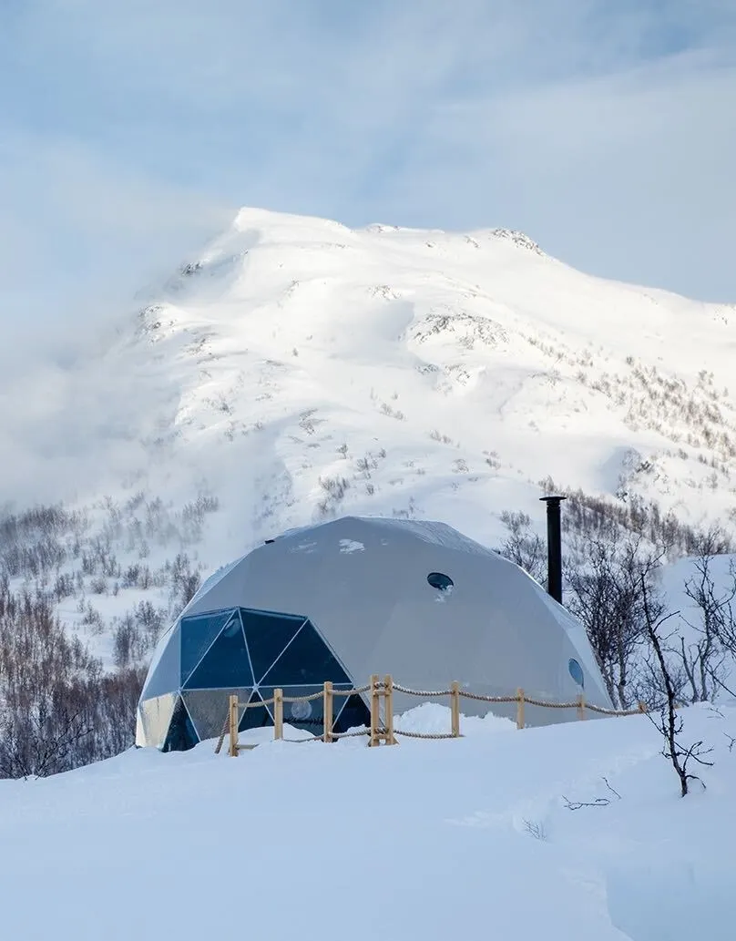grey dome on side of mountain 