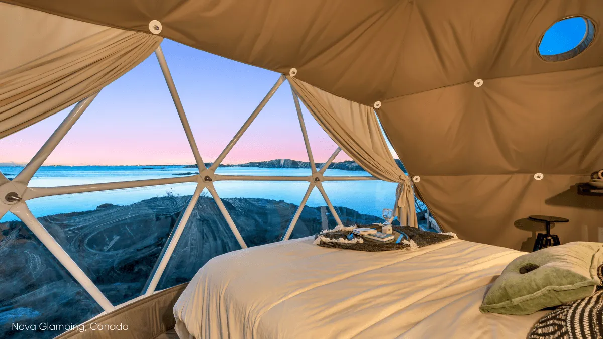 bed in geodesic dome glamping canada