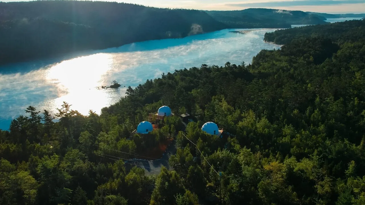 three domes in a lake resort in Nalu Retreat & Nordic Spa, Nova Scotia, Canada