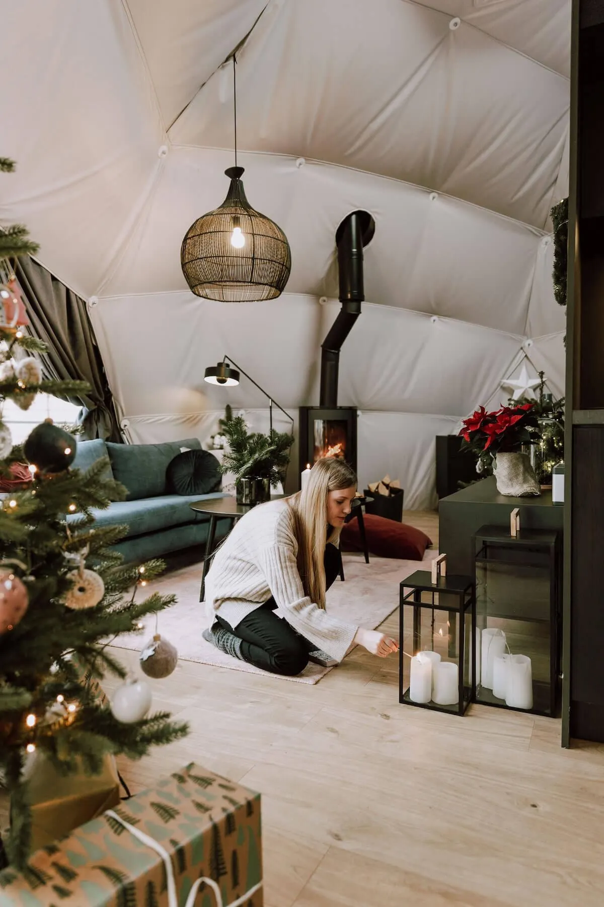 girl decorating interior glamping dome fdomes Christmas