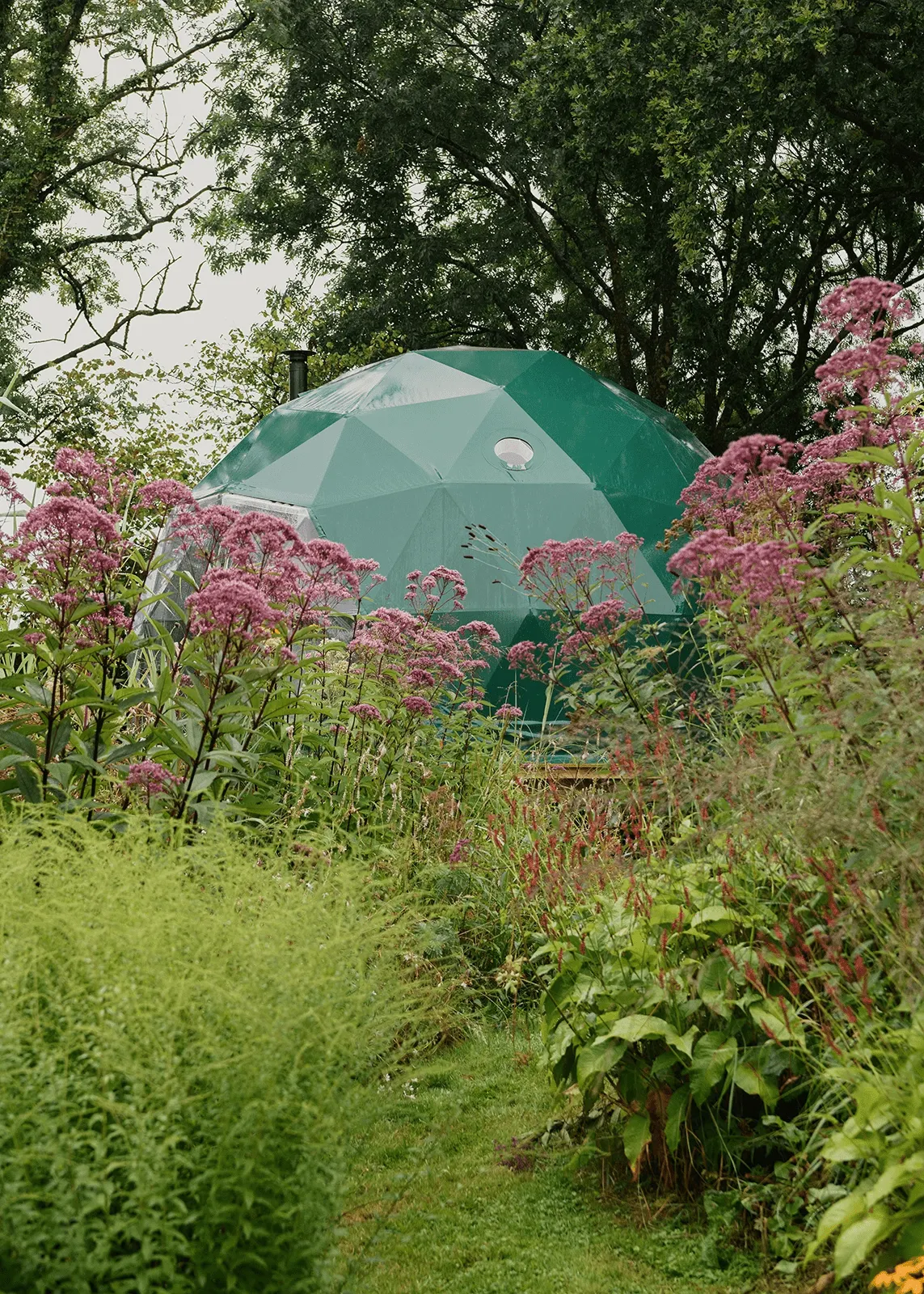green geodesic dome on the field