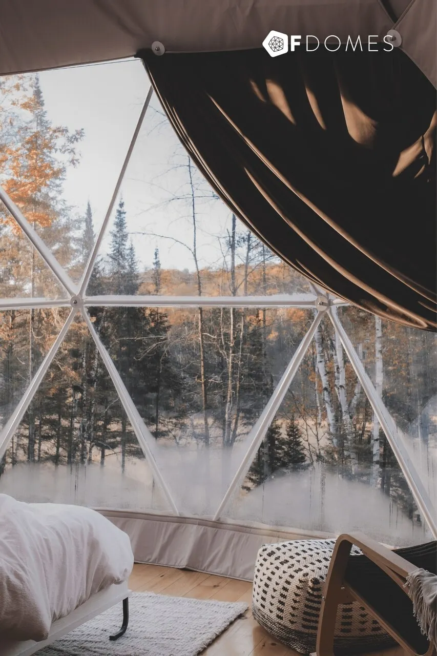 inside of a cozy FDomes cabin during the winter in Canada