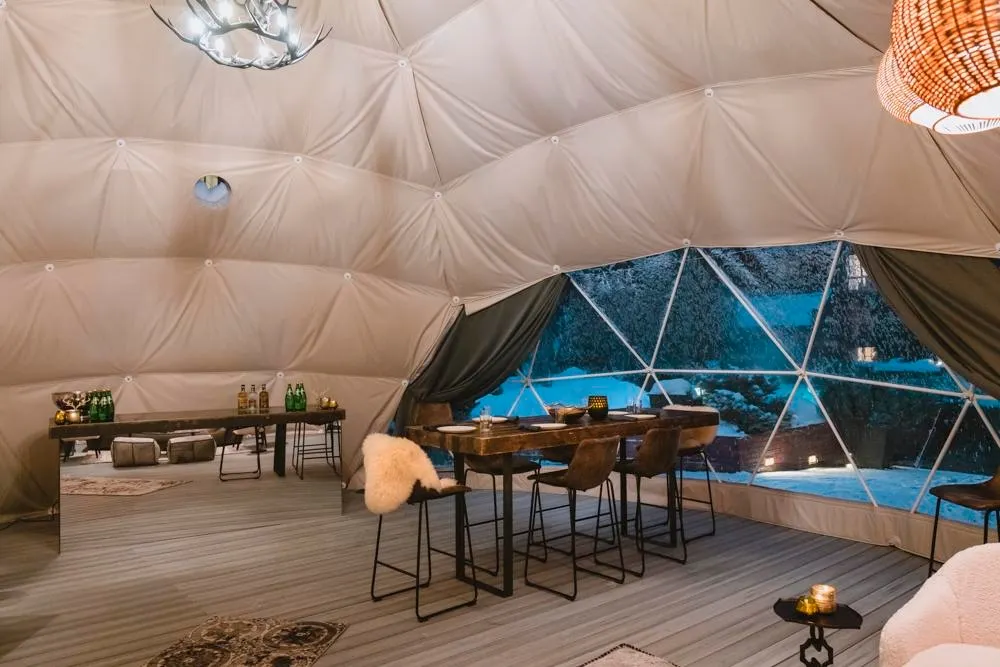 The center of the geodesic dome overlooking the table and window