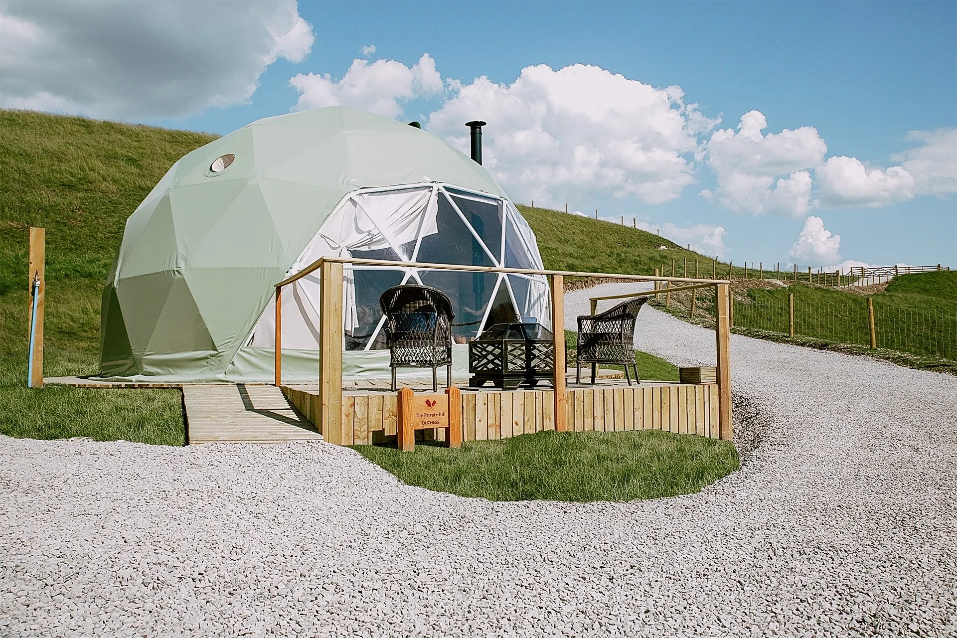 green geodesic dome at the hill