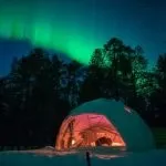 Harriniva Hotels & Safaris in Finland dome during aurora borealis