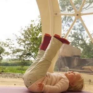 yoga retreat kid playing at geodesic dome from FDomes